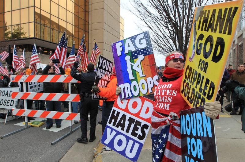Protesters greet those from Westboro Baptist Church in St. Charles